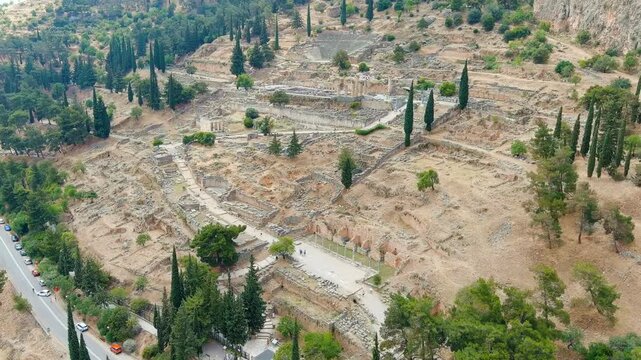 Delphi, Greece. Ruins of the ancient city of Delphi. Sunny weather, Summer. Drone footage