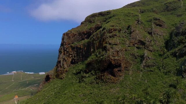 Aerial view of Los Silos volcanic cliffs in Tenerife's serene coast