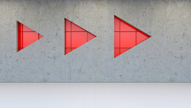 Modern concrete wall interior with three red triangle shapes