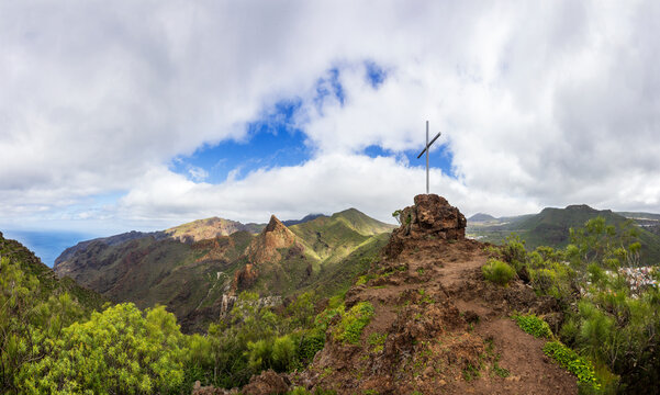 Cross on Montana de Guama peak with view of Risco Blanco in Tenerife