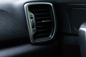 Obraz premium Air speed and direction controller in a car. Closeup.