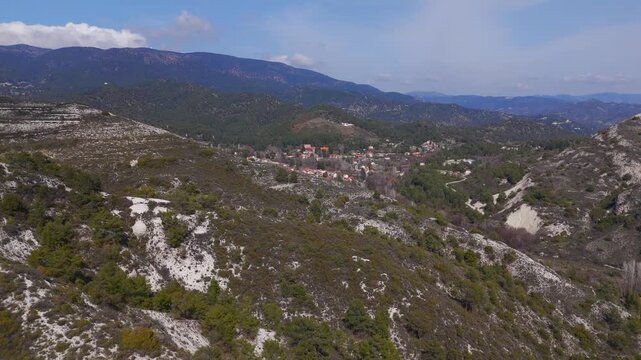 Wide Drone Shot of Rugged Troodos Mountain Valleys Towards Pera Pedi Cyprus