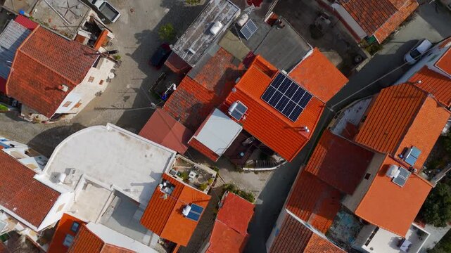 Vertical Aerial Top Down View of Winding Streets and Traditional Stone Rooftops in Laneia Cyprus