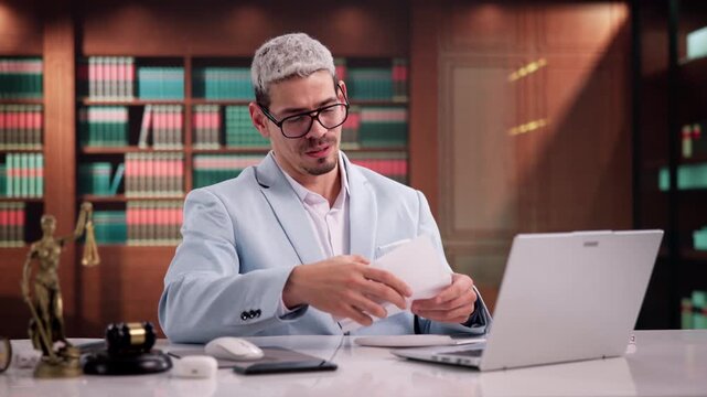 Attorney Carefully Reading Troubling Letter About Client's Legal Case