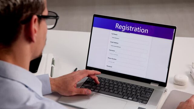 Man Filling Out An Online Form