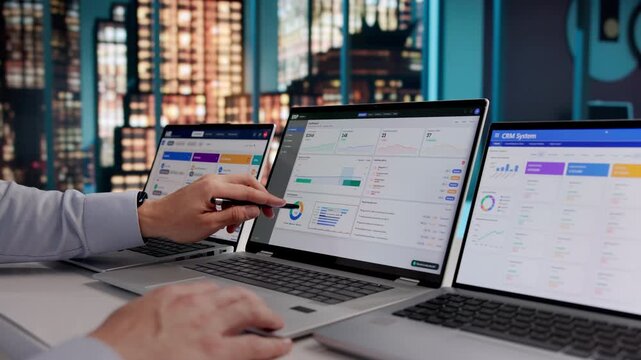 ERP Consultant Reviews Cloud Software Solutions On Laptop
