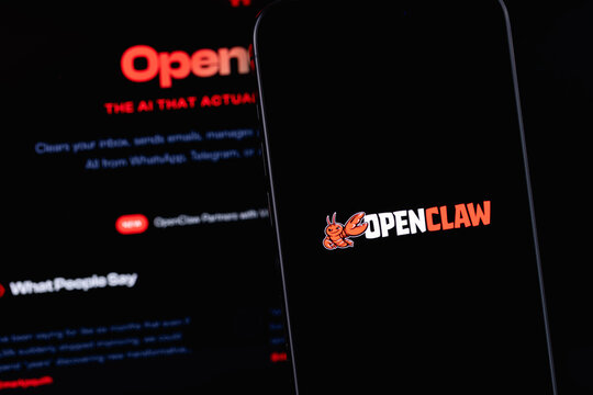 OpenClaw logo on a screen mobile smartphone iPhone with display notebook. OpenClaw is an open-source autonomous AI agent. Batumi, Georgia - March 19, 2026