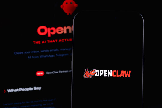 OpenClaw logo on a screen smartphone and notebook. OpenClaw is an open-source autonomous AI agent. Batumi, Georgia - March 19, 2026