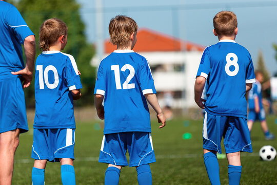 Football Academy Members With Coach. Boys in Football Team. Children Play Match in Youth Soccer League. Friends Have Fun Playing Outdoor Football Tournament. School Sports Team Members