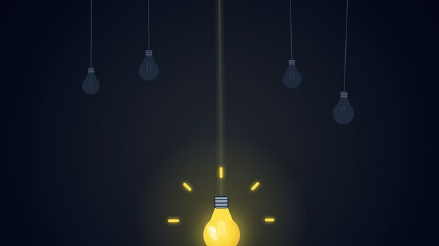 Glowing light bulb descending in dark room for business inspiration and unique ideas concept