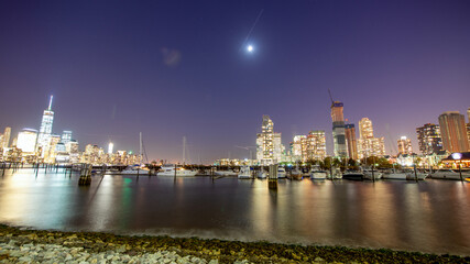 Naklejka premium Lower Manhattan at Sunset, Capturing the Stunning Skyline from Jersey City