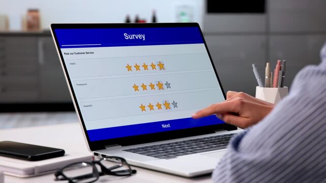 Young Woman Carefully Filling Out Online Survey Form