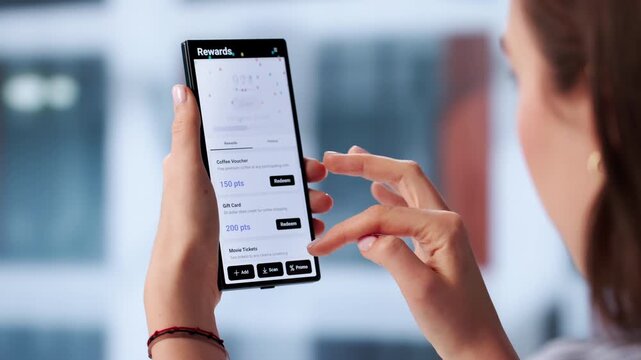 Person Using A Loyalty App On Phone