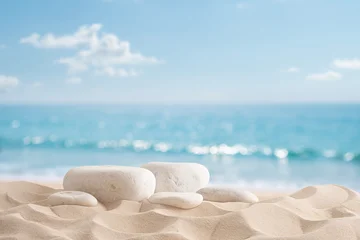 Fototapeten Sommer Stone podium for cosmetic product display on tropical sand beach and blurred sea and sky background  © didecs