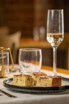 Traditional Pastiera Napoletana cake served on a rustic restaurant table