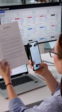 Office Manager Scanning Document With Smartphone