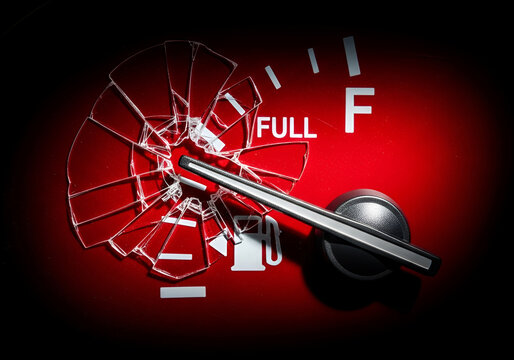 Fuel gauge exceeding limit showing gasoline price increase due to global conflict