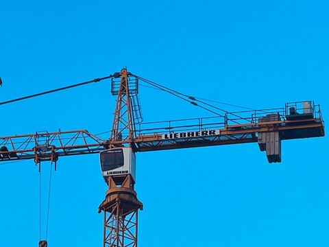 construction crane liebherr against blue sky