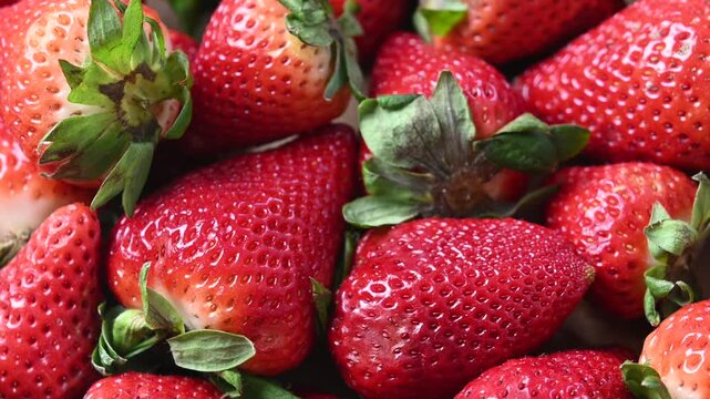 Rotating strawberries background rotating