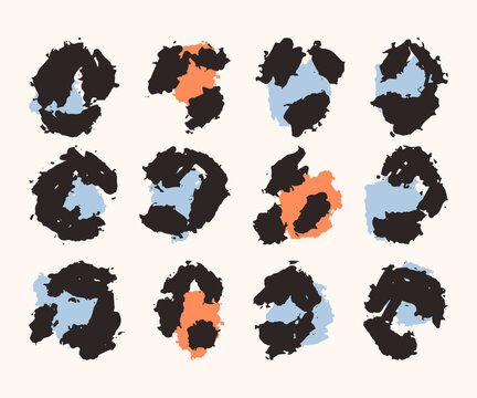 Vector leopard spot elements set in black, cyan and orange on cream background 