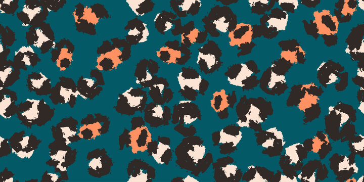 A seamless vector leopard pattern in black, white and orange on deep teal background with hand-painted spots