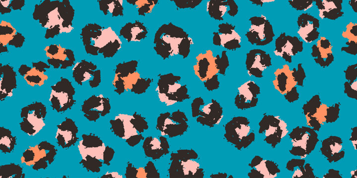 A seamless vector leopard pattern in black, pink and orange on vibrant teal background with hand-painted spots