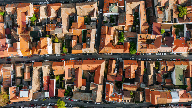 Aerial view of the historic Zemun district featuring dense orange-tiled rooftops and narrow streets with parked cars in Belgrade, City of Belgrade, Serbia.