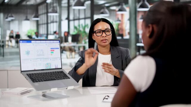 Person Meets With Financial Advisor