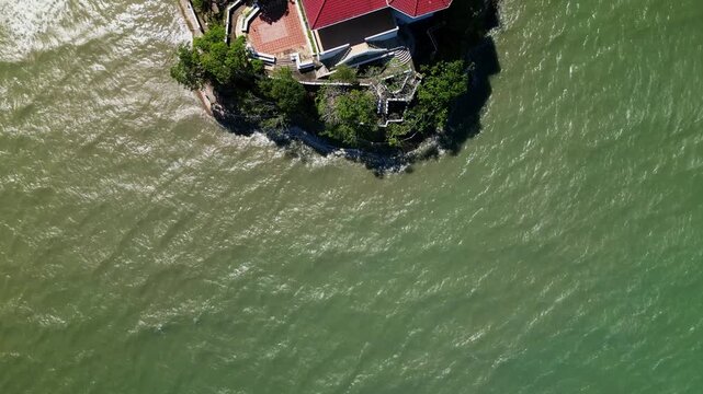 Aerial top-down shot of Roca Encantada showing the coastal property layout and surrounding waters in Guimaras, Philippines