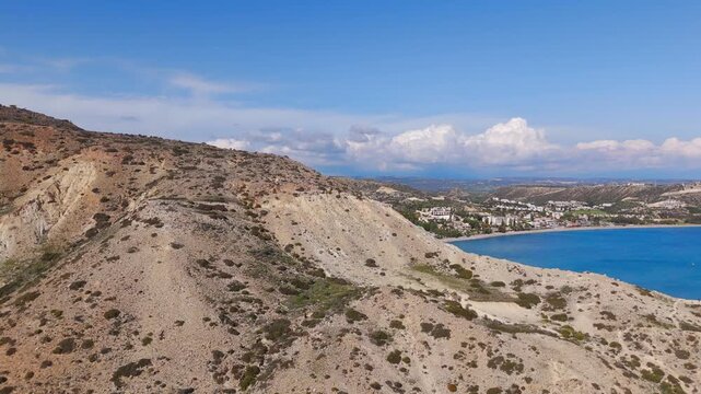 Aerial Drone Flyover of Rugged Cape Aspro Terrain Towards Pissouri Beach Cyprus