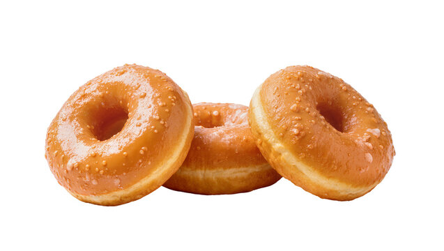 Glazed cruller donuts with sprinkles arranged in a row