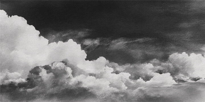 Dramatic stormy clouds cast a dark overcast shadow over the mountains and sea under a blue summer sky during a powerful nature weather event