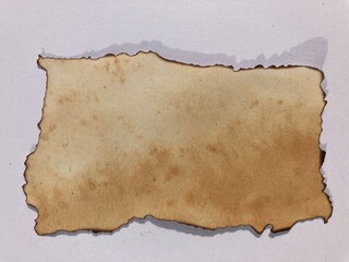 Fototapeta premium Burnt Paper Texture & Charred Edges. Antique paper concept. Rough burnt texture paper. 
