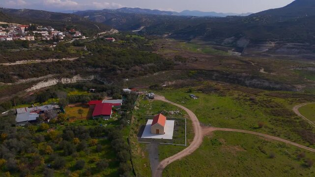 Aerial Orbit of Modern White Agia Paraskevi Orthodox Church Near Kouris Dam Limassol Cyprus