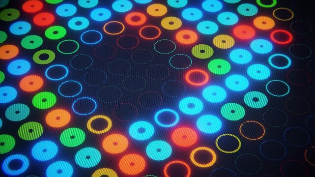 Glowing colorful digital circles lights on led screen. Retro gaming style. Seamless loop.