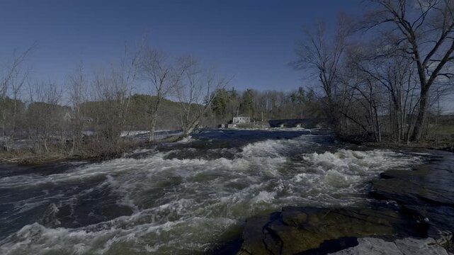 A fast moving river on a spring day