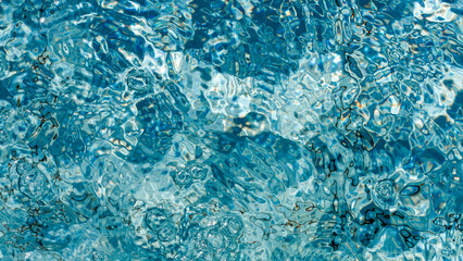 Fototapeta premium Glassy Blue Pool Water Reflections For A Calming Abstract Liquid Backdrop