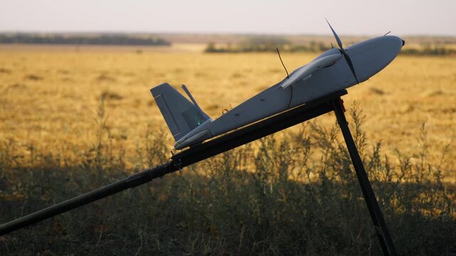 Military ISR interceptor Drone Aircraft with electrical engines ready to takeoff from starting platform. Drone hunter. unmanned systems technology applying in military and civilian sector
