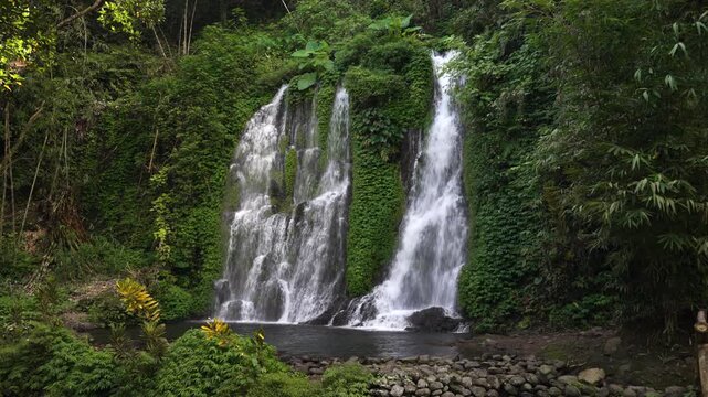 Jagir Waterfall in lush forest, a serene escape in East Java