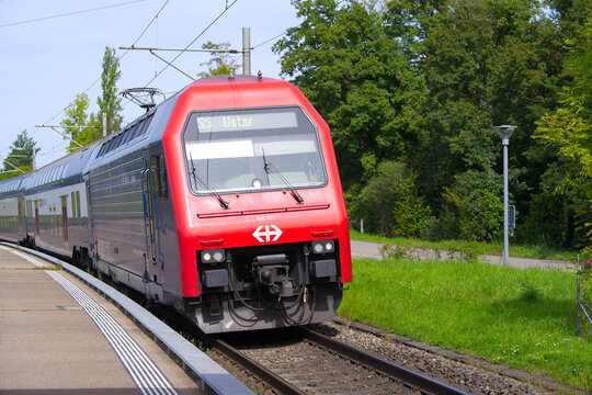 SBB CFF FFS passenger train at railway station of Swiss village of Glattfelden on a sunny late summer day. Photo taken September 7th, 2025, Zurich Glattfelden, Switzerland.
