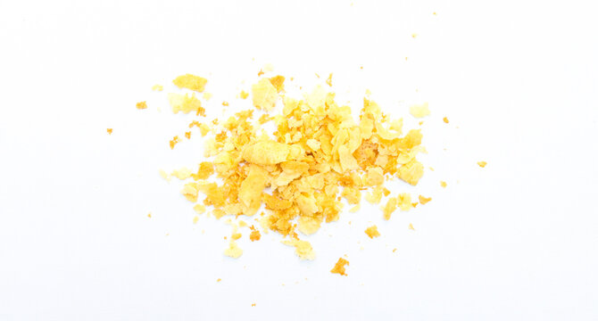 Pile biscuit crumbs, flying cookies isolated on white background, clipping path