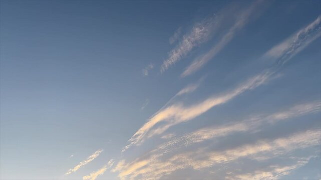 Dramatic sky timelapse from blue daylight to dark navy twilight with cirrus clouds at sunset full frame sky_011