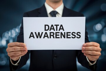 Obraz premium IT professional holding a sign to promote Data Awareness