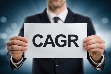 Obraz premium Financial Professional Holding a Sign with the Acronym CAGR