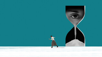 Obraz na płótnie Canvas Woman walking past surreal hourglass with human eye and falling sand in minimal space. Concept of time pressure, deadline stress, self awareness, mortality reflection and personal journey.