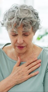 Elderly woman, chest pain or cough with cardiac arrest for heart attack, disease or illness in home. Sick, senior person or patient with respiratory infection or hypertension for high blood pressure