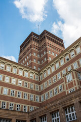 Fototapeta premium Classic Red Brick Building with Detailed Architectural Facade