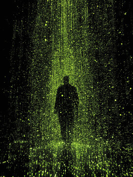 human silhouette behind thousands of gloving green parts