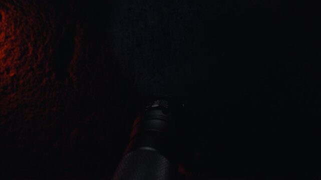 Creepy Man Appears in the Beam of a Flashlight