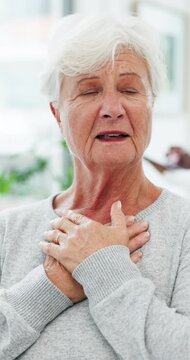 Chest pain, breathing and senior woman in clinic for checkup with lung infection, asthma or heartburn. Medical consultation, discomfort and elderly female patient with respiratory virus in office.